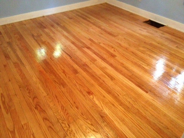 a refinished and shining hardwood floor