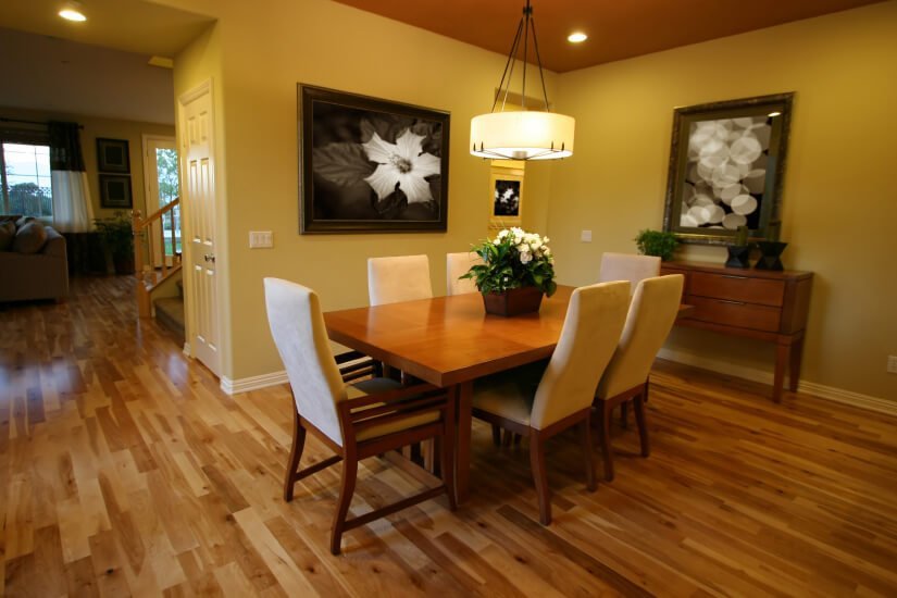 A Von Ormy dining room with floors refinished by Fabulous Floors.