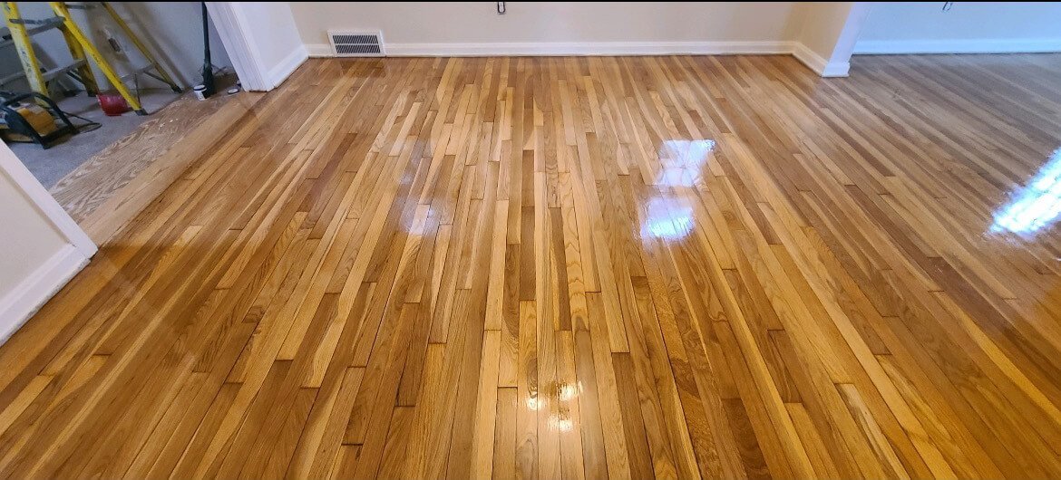 a refinished hardwood floor in a dining room