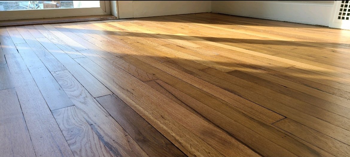 a uniquely designed hardwood floor surface in a New Braunfels home